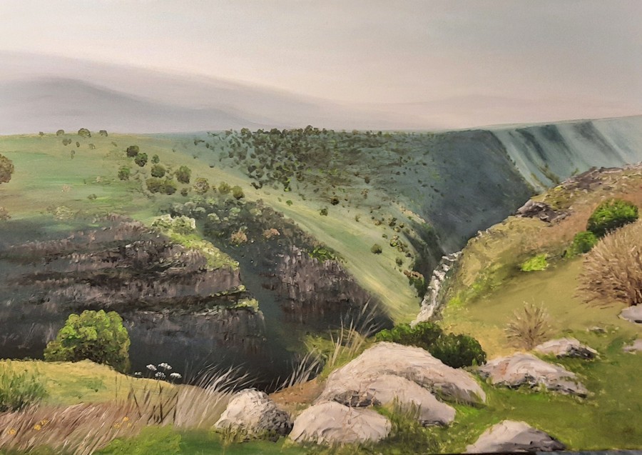 Acrylic painting of deep basalt canyon with rolling green hills by Israeli artist Pavla Parik, pavla-parik.com
